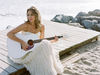 The Grammy-winning singer-songwriter puts a new spin on the holidays with Christmas In The Sand