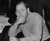 American songwriter Johnny Mercer at the piano in 1954