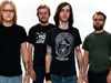 With his bandmates in The Sword (second from right)
