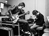 Bruce Foxton and Paul Weller tune-up ahead of a Jam gig