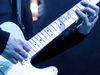 The lighting has the blues, but does this guitarist? blank
