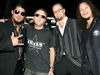 Metallica happily pose for the snappers at the 2004 US premiere - bizarre given what they're going to see on screen!