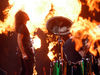 Hammett and Ulrich surrounded by flames in Idaho, 2004