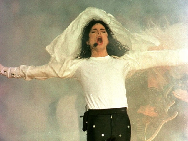 The world at his feet...and six-string power behind him