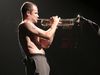 Flea sounds the trumpet at the Mullens Center, Massachusetts, 2003