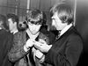 Charlie Watts signs an autograph for a fan