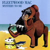 Fleetwood Mac - Mystery To Me A curiously phallic book and cake-eating ape sucks its fingers at the beach. Quite frankly, this is a mystery to us too