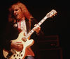 Alex Lifeson on stage in 1980, the year Moving Pictures was written
