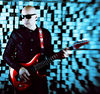 Joe during a photo shoot for Black Swans And Wormhole Wizards