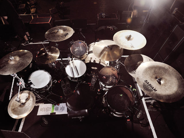 Arya Goggin's drum setup Drums: Tama Starclassic Bubinga: 22x18-inch bass drum; 12-inch tom, 14 & 16-inch floor toms; 14x6½-inch Charlie Benante Signature snare; 10x5-inch Tama Artwood 'Popcorn' snare Cymbals: Sabian: 14-inxh AAX Metal hi-hat (top); 14-inch HHX Power hats (bottom); 18-inch HHX Legacy crash; 19-inch AAXplosion crash; 21-inch HHX Groove ride; 20-inch HHX Studio crash; 20-inch Vault crash 20-inch AA China Plus: Tama hardware & Iron Cobra pedal; Vater 5B sticks; Roland TD-12 brain & triggers; Ultimate Ears in-ear monitors