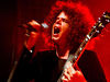 The only guy on the album with more hair than Slash?