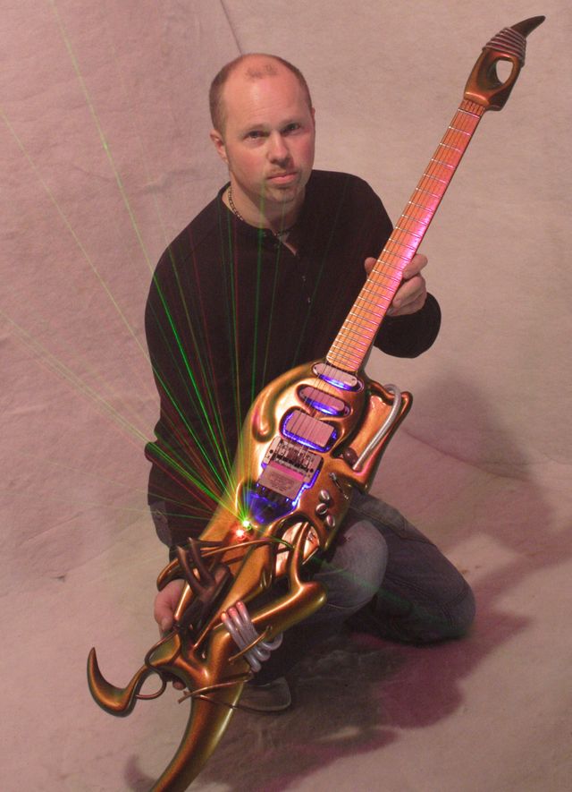Designer Alister Hay with the Ultra guitar