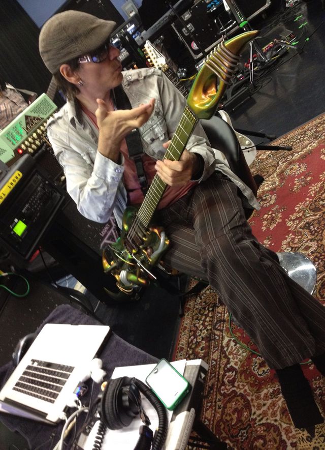 Steve Vai vibes out in rehearsal with his Ultra guitar