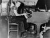 At the piano in 1957