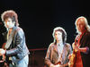 Mike Campbell and Petty with Bob Dylan, 1985