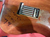 Around the back Yankees baseball great Mickey Mantle signed the guitar after a chance meeting in 1985