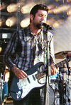 Deftones singer Chino Moreno also took on guitar duty for a few songs in their set, here with a humbucker-loaded Strat.