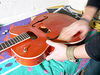 Hand-sanding the body blank