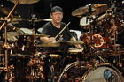 Win signed Neil Peart DVD and Remo head