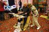 Busker kit Al Murray checks out a crazy invention