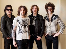 The Darkness play hometown show, debut new songs