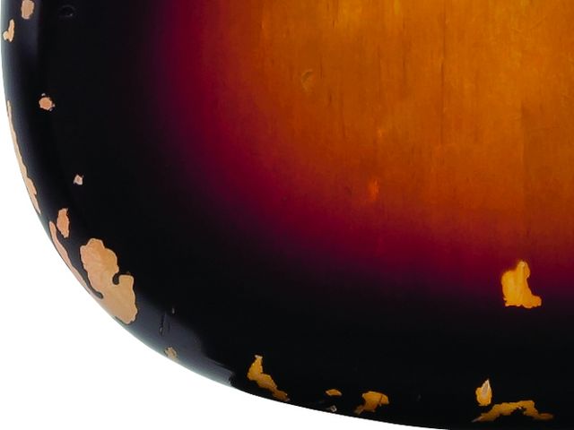 The Finish The nitrocellulose lacquer has been aged to reflect the beaten finish of Kurt's guitar.