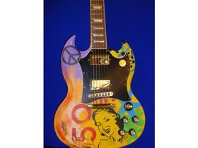 Cancer Research UK opens exclusive guitar auction