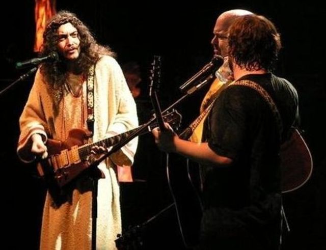 John sees the guitar as a religious calling...